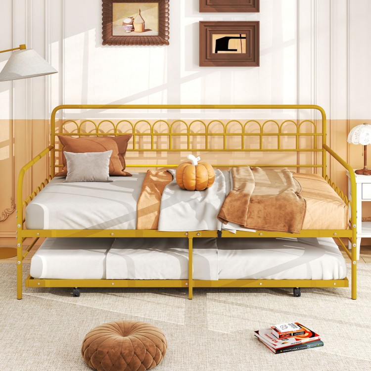 Twin daybed with curved backrest and armrests in gold, featuring a pull-out trundle for extra sleeping space.