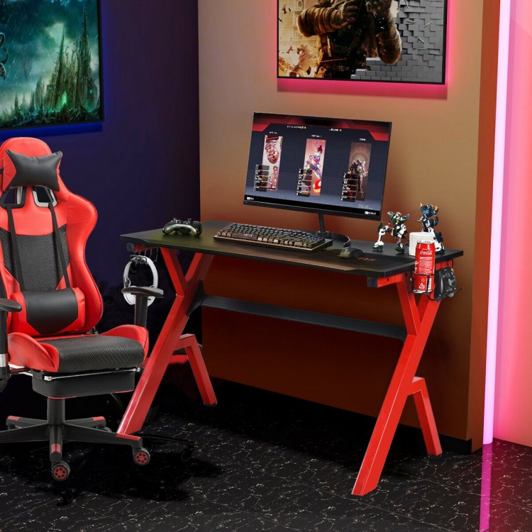 Ergonomic gaming desk with carbon fiber surface and R-shape steel frame, featuring a cup holder and headphone hook for.