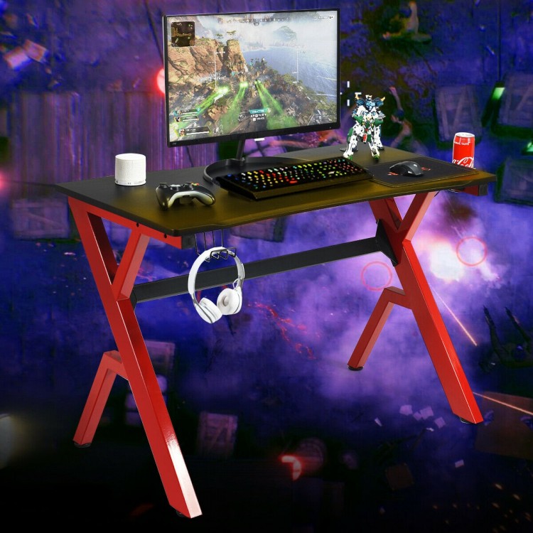 Ergonomic gaming desk showcasing a spacious carbon fiber surface and sturdy R-shape steel frame for enhanced stability.