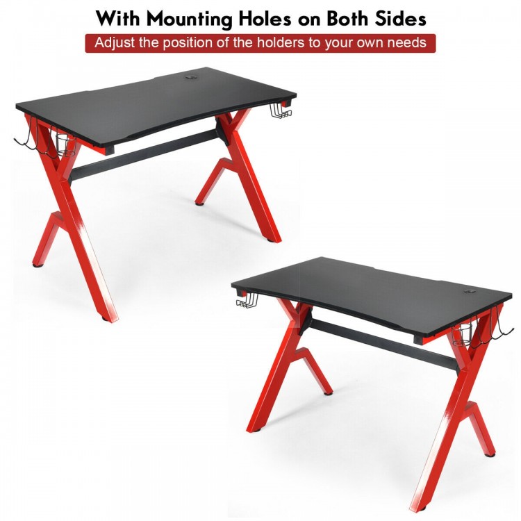 Ergonomic gaming desk with carbon fiber surface, R-shape steel frame, and adjustable mounting holes for optimal.
