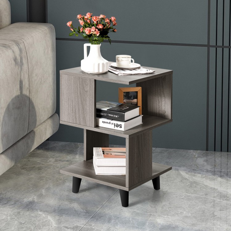Stylish wooden nightstand with legs, showcasing an asymmetrical design and smooth surface for easy cleaning in any room.