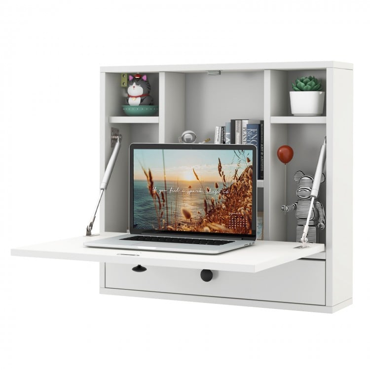 Foldable wall-mount desk in white with laptop, 6 shelves, and drawer, perfect for small spaces like dorms or studies.