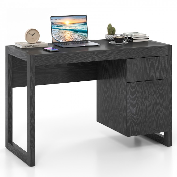 Modern black computer desk with spacious tabletop, drawer, and cabinet for versatile home office use.