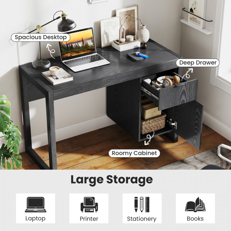 Modern black computer desk with spacious tabletop, large drawer, and cabinet for ample storage in a stylish design.