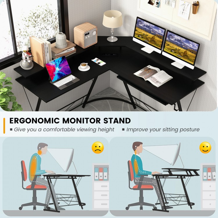 L-shaped black computer desk with ergonomic monitor stand, power outlet, and adjustable foot pads for stable workspace.