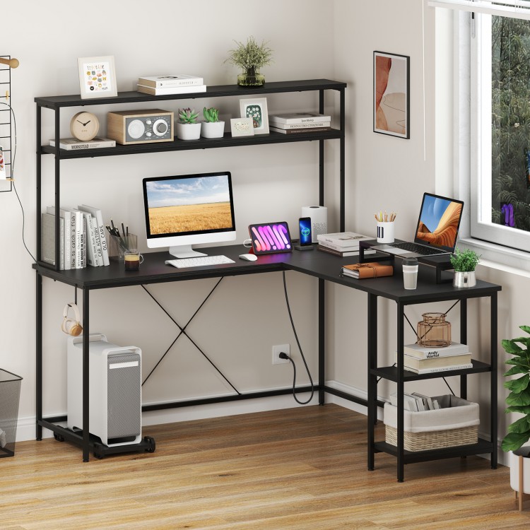 L-shaped reversible gaming desk in black with LED strip, power outlets, and adjustable shelves for organized workspace.