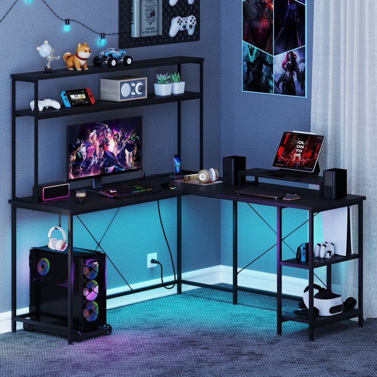 L-shaped black gaming desk with RGB LED lights, adjustable monitor stand, and storage shelves for organized gaming.