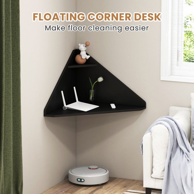 Floating triangular corner desk in black with storage shelf, ideal for maximizing space in living rooms or offices.