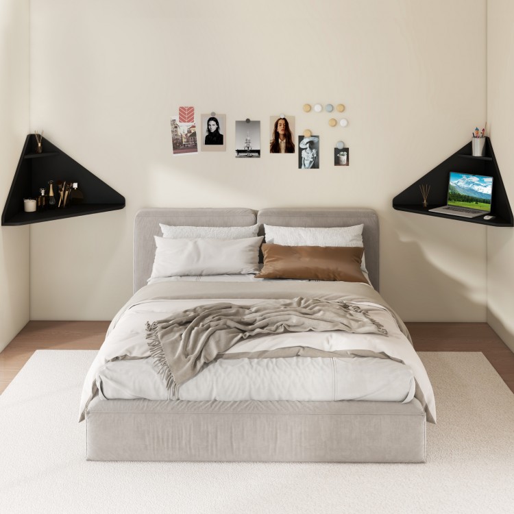 Floating triangular corner computer desk in black with wall-mounted design, ideal for compact spaces and modern decor.