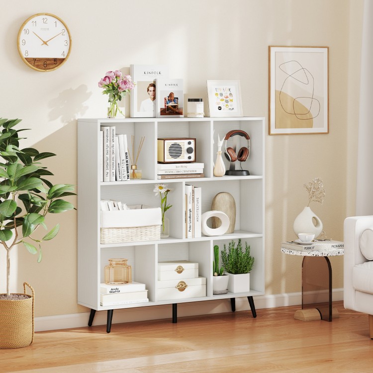 8-cube bookcase in white with 5 tapered metal legs, perfect for storing books and decor in any room.