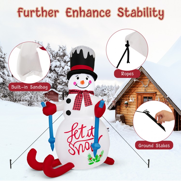 6FT Christmas inflatable decoration with built-in sandbag, LED lights, and stability accessories for outdoor use.