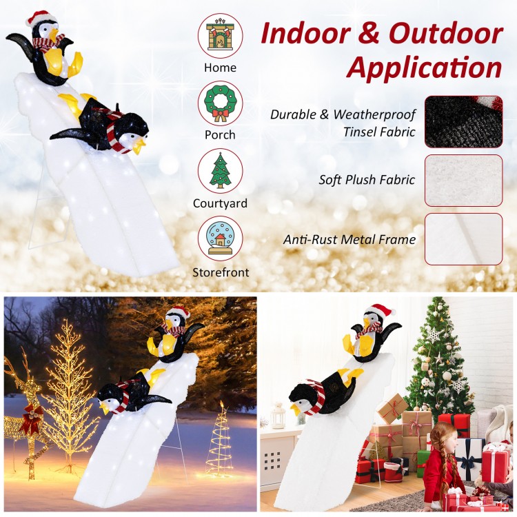 4 feet Christmas penguin decor on a snowy slide with 130 LED lights, perfect for indoor and outdoor holiday decoration.