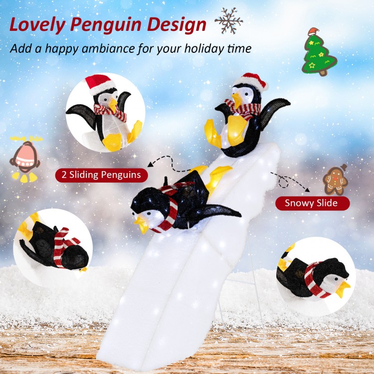 Christmas penguin decor featuring a snowy slide, 130 LED lights, and durable weatherproof fabric for festive outdoor.
