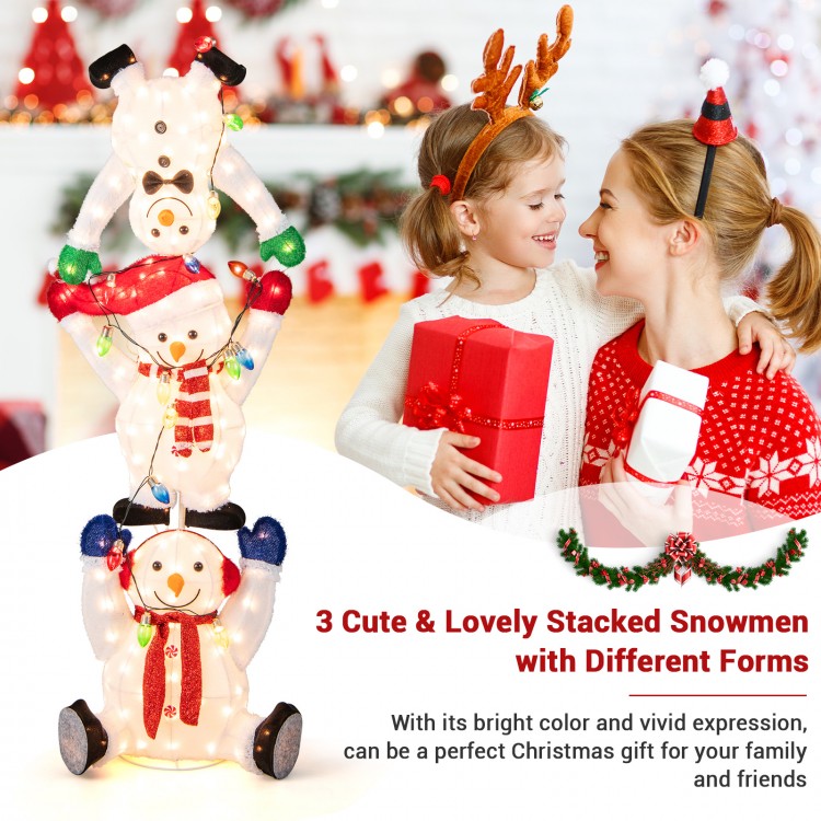 Brightly lit stacked snowmen Christmas decoration, featuring colorful lights and durable fabric for festive indoor or.