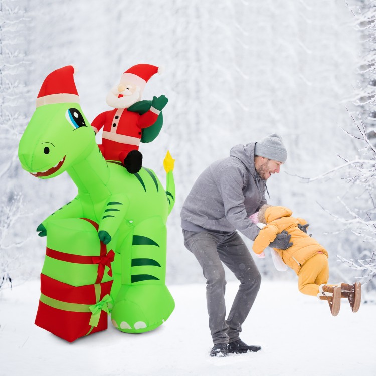 Inflatable 8-foot dinosaur with Santa and gift boxes, perfect for outdoor Christmas decoration.