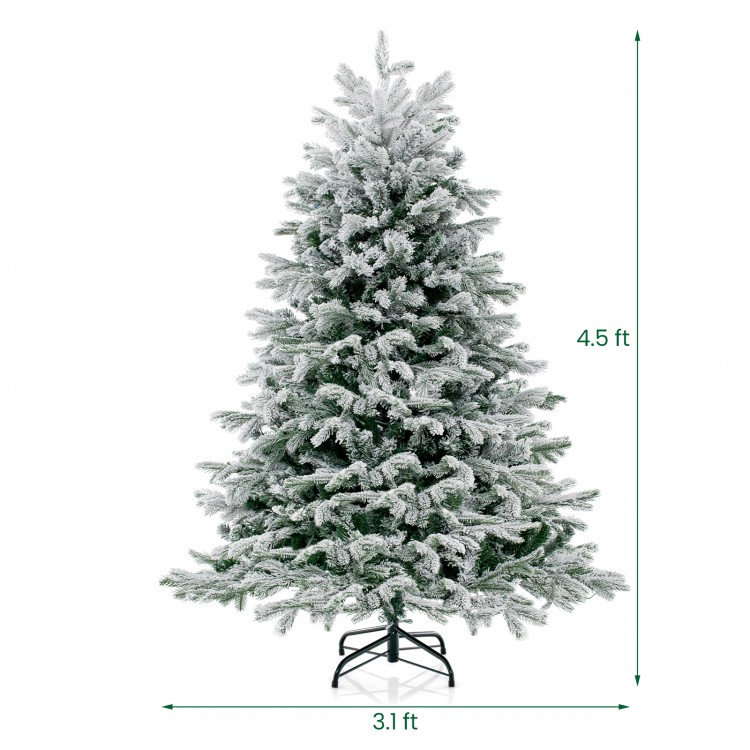 Snowy 4.5 ft artificial Christmas tree with warm white LED lights, featuring a hinged design and strong metal stand.