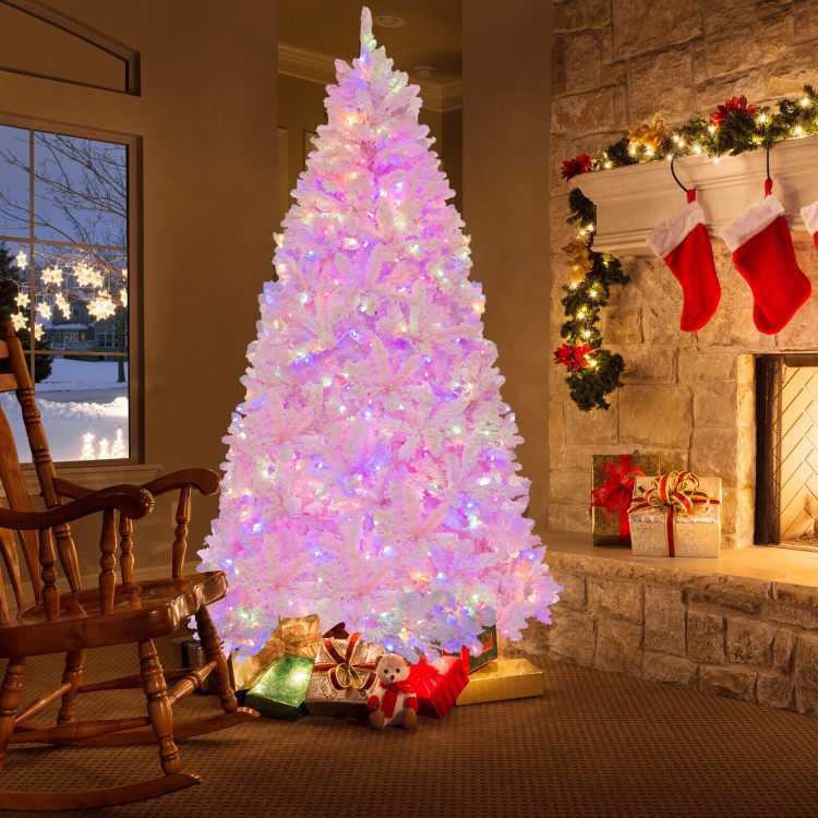 Flocked 7-foot artificial Christmas tree with 500 LED lights, showcasing colorful lighting and 1200 branch tips for.