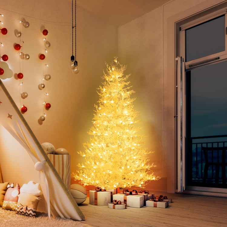 Glowing 6 feet artificial Xmas tree with 383 PE branch tips and 300 LED lights, perfect for festive home decor.
