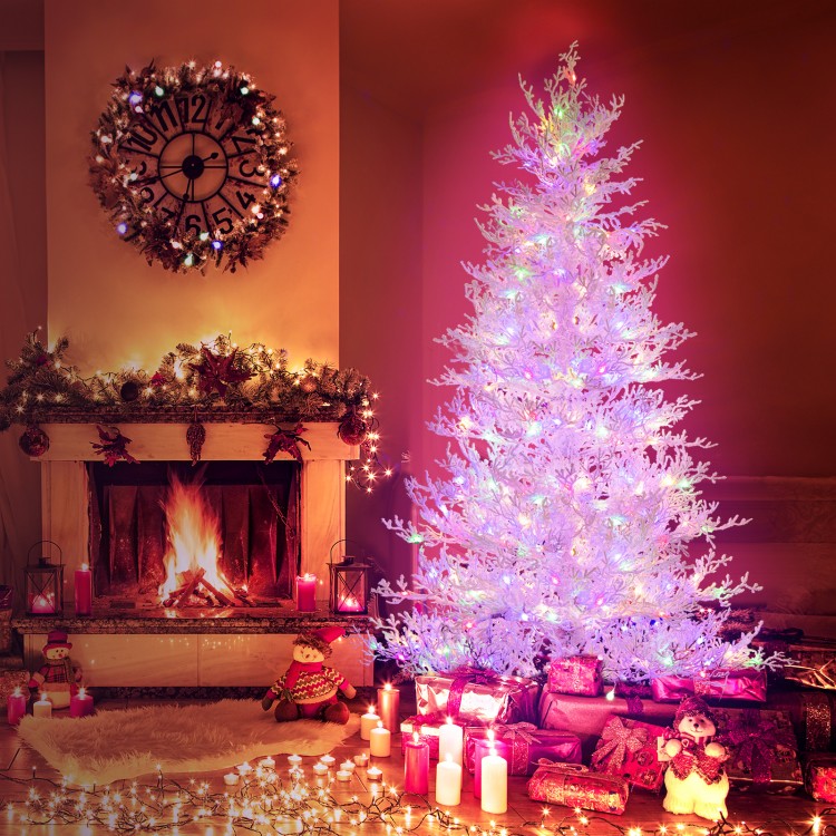 6 feet artificial Xmas tree with 383 PE branch tips and 300 LED lights, beautifully lit for festive holiday decor.