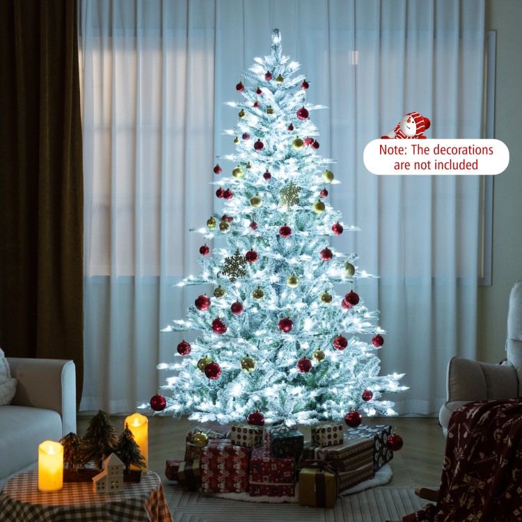 7-foot snow flocked artificial Christmas tree with cool white LED lights, perfect for festive home decoration.
