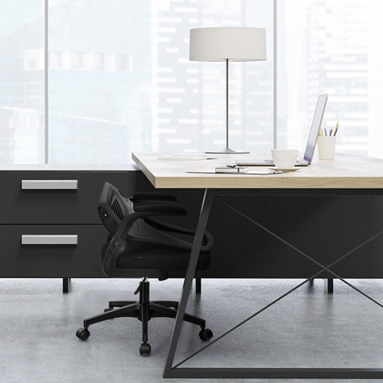 Swivel mesh office chair in black with foldable backrest and flip-up arms, ideal for compact home office spaces.