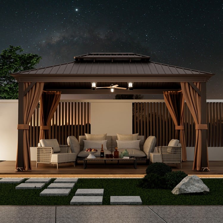 Double-roof hardtop gazebo with galvanized steel roof, featuring a cozy seating area for outdoor relaxation.