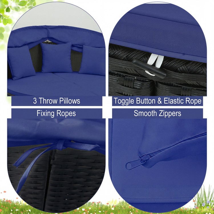 Close-up of the Clamshell patio round daybed in blue, featuring smooth zippers, fixing ropes, and three throw pillows.