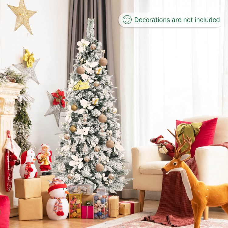 Snow flocked 6ft Christmas pencil tree with white berries and flowers, showcasing a charming design for holiday.