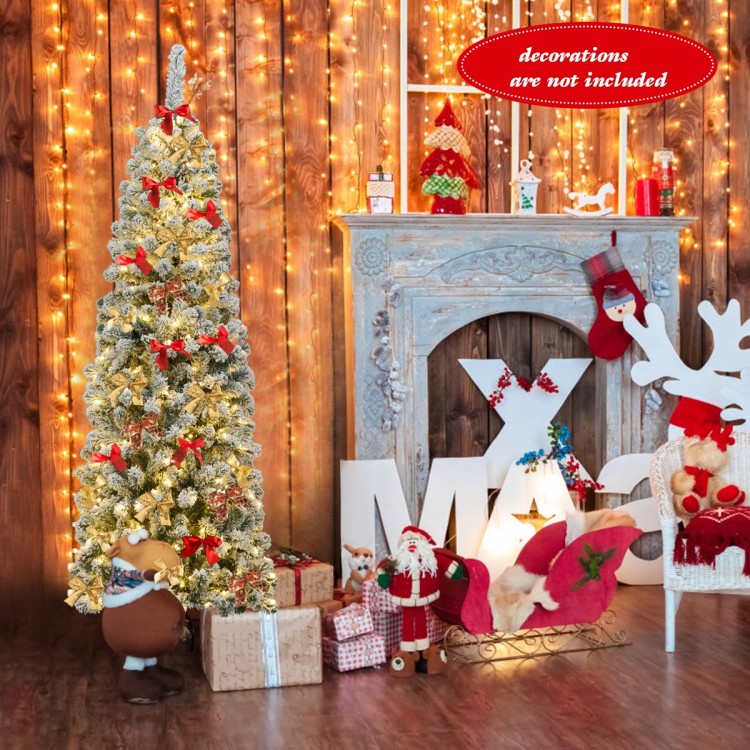 Snow flocked 6-foot pre-lit pencil Christmas tree with 250 LED lights, ideal for creating a cozy holiday atmosphere.