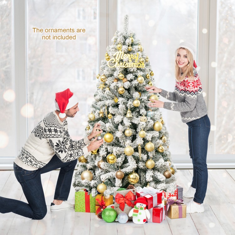 6 feet flocked Christmas tree with snow decor, featuring 600 branch tips and a sturdy metal stand for festive.