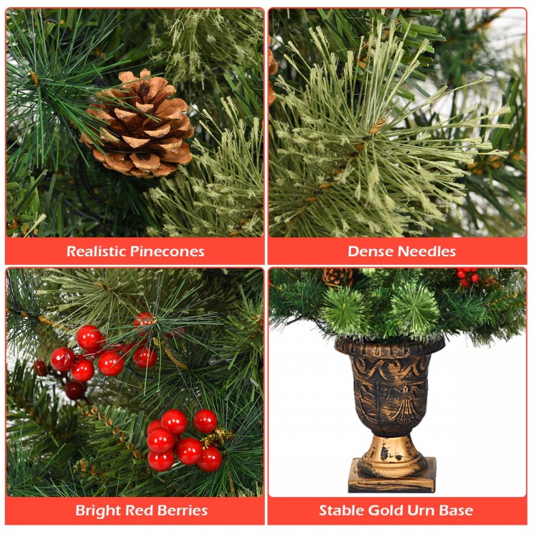 Close-up of red berries and realistic pinecones on a 3' LED Christmas entrance tree with dense PVC needles.