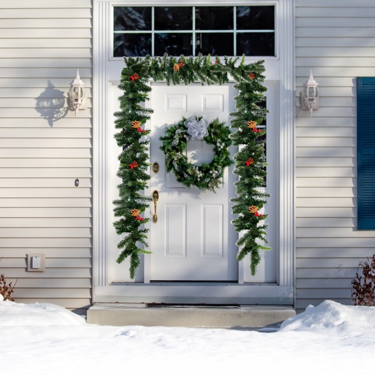 9FT pre-lit artificial Christmas garland adorned with red berries, pine cones, and 100 LED lights, ideal for cheerful.