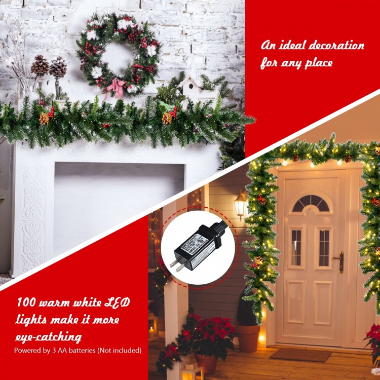 9FT pre-lit artificial Christmas garland with red berries and 100 warm white LED lights for festive indoor or outdoor.