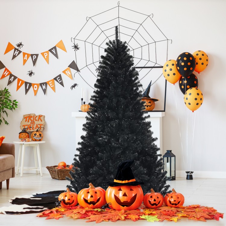 Black artificial 6ft Halloween tree with purple LED lights, surrounded by pumpkins and festive decorations for spooky.