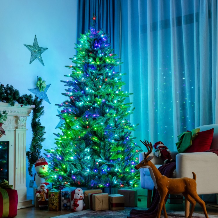 Pre-lit 7' artificial Christmas tree with colorful LED lights, creating a festive atmosphere for holiday celebrations.