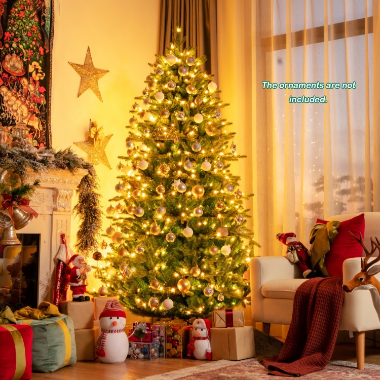 Pre-lit 7' artificial Christmas tree with 540 LED lights, showcasing a lush design for festive home decoration.