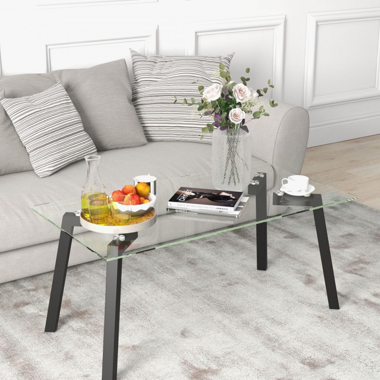 Modern tempered glass coffee table with metal frame, showcasing a sleek design and easy-to-clean surface for living.