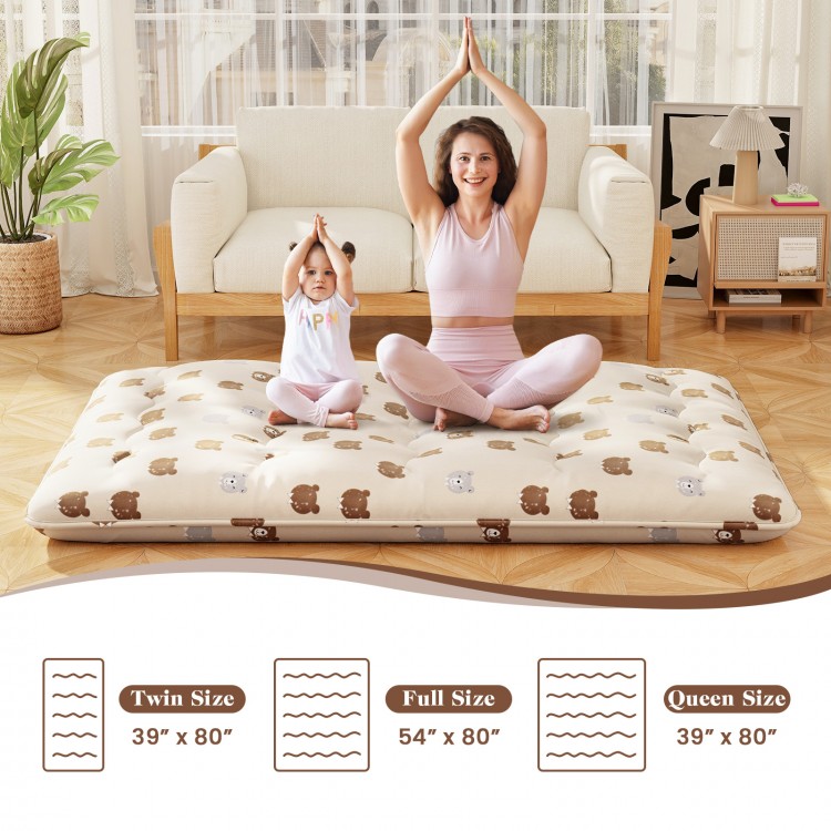 Foldable full-size futon mattress with washable cover, ideal for camping, play mat, or floor use, shown with child.