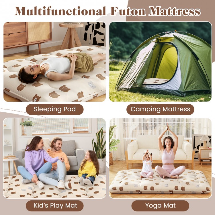Foldable futon mattress in a cozy setting, ideal as a camping mattress or play mat for kids, featuring a washable cover.