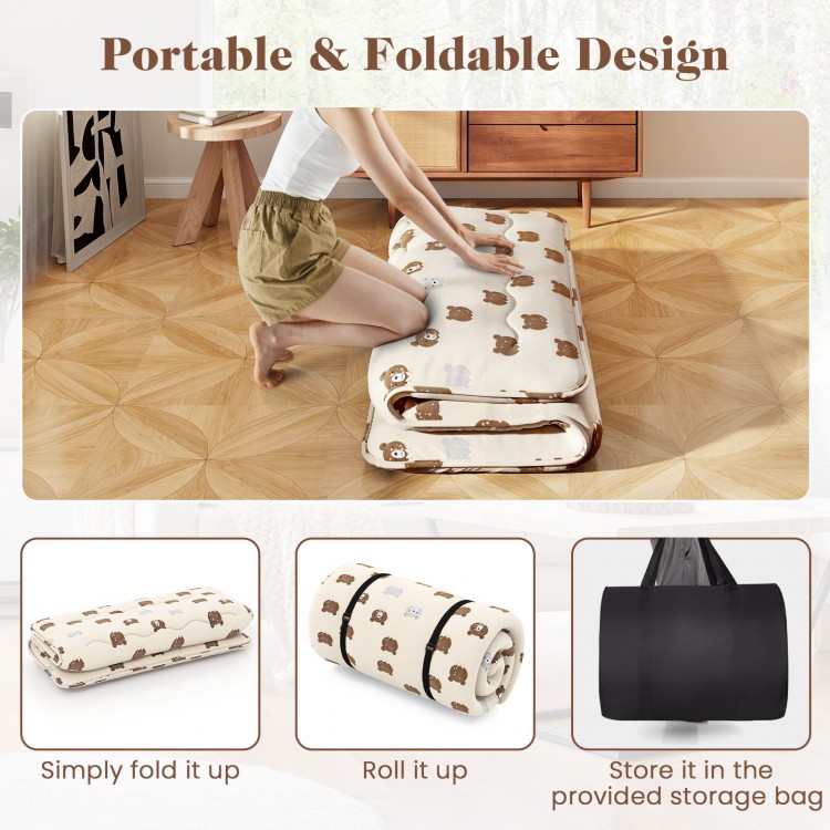 Foldable futon mattress with washable cover, rolled up for easy transport, ideal for camping or home use.
