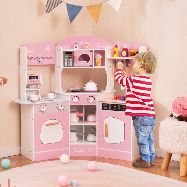 Wooden play kitchen in pink with slide, coffee machine, and interactive features for kids' imaginative play.