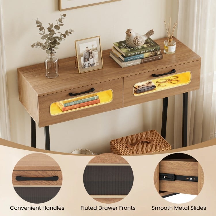 Console table with LED lights, featuring fluted drawer fronts, two large drawers, and an open shelf for storage.