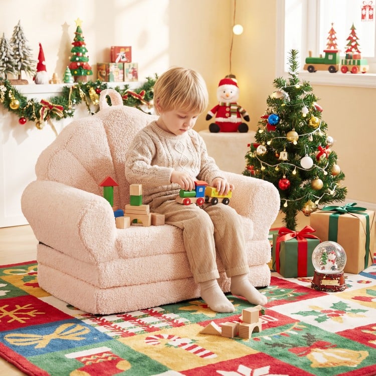 Convertible kids sofa in beige, featuring a soft teddy fleece fabric, used as a chair for playtime and relaxation.