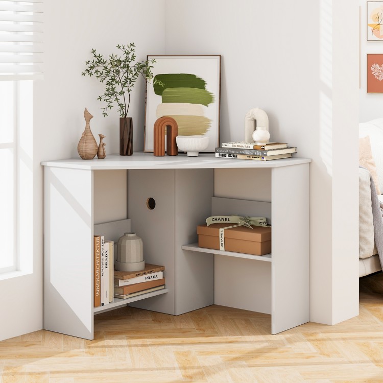 Corner computer desk in white with triangle design, storage shelves, and cable management for efficient workspace.
