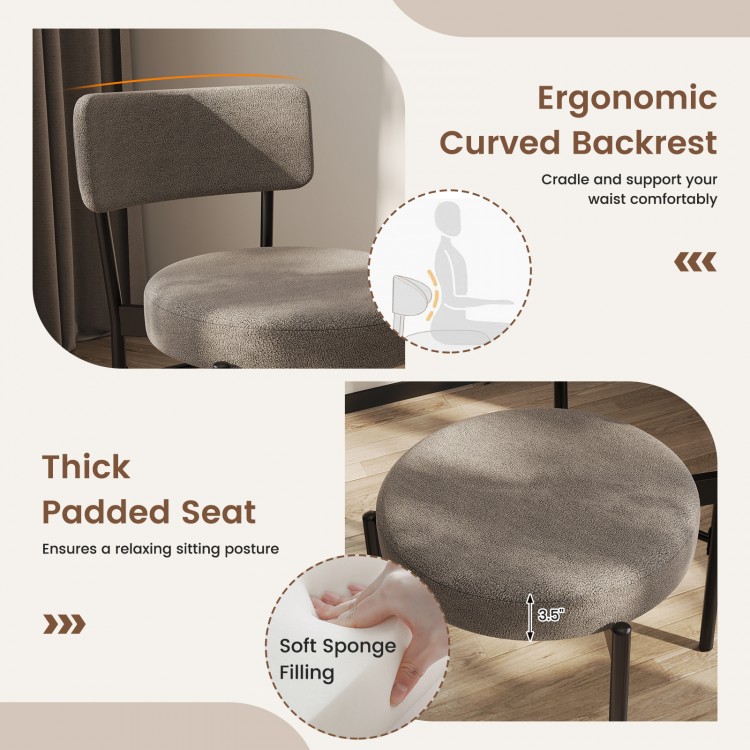 Curved backrest and thick padded seat of the gray dining chair, designed for comfort and contemporary style.