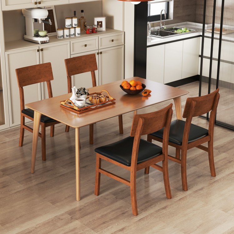 Set of 2 dining chairs with rubber wood legs and black faux leather upholstery, ideal for kitchen or dining room use.