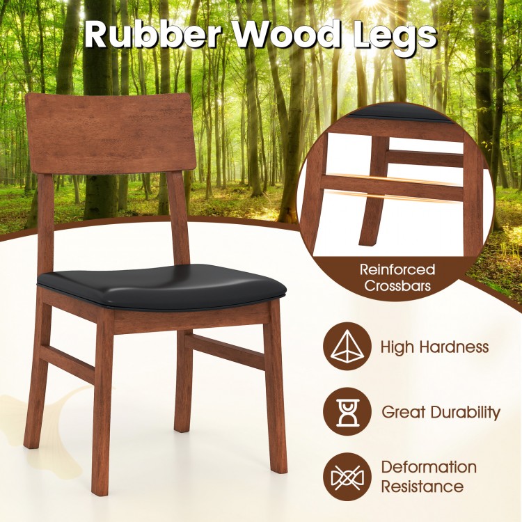 Dining chair with rubber wood legs and black faux leather seat, featuring ergonomic backrest and reinforced crossbars.