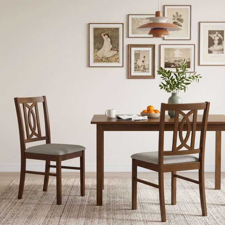 Walnut dining chair featuring a hollowed backrest and soft faux linen upholstery, ideal for enhancing dining room.