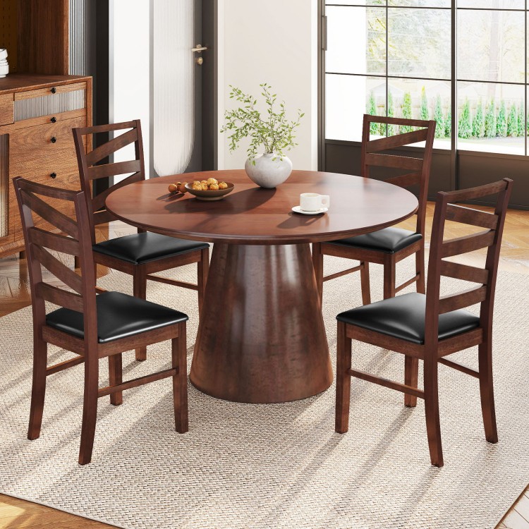 Set of two walnut dining chairs with rubber wood legs and PU leather upholstery for a rustic kitchen aesthetic.