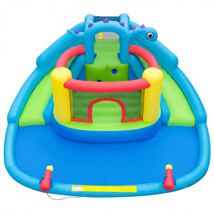 Dinosaur-themed inflatable bounce house with double slides, splash pool, and climbing wall for backyard fun.